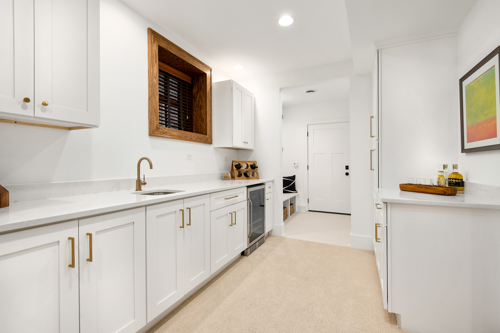 3733 North Wayne Avenue Chicago, IL 60613 - Photo 29 of 40 a large white kitchen with a sink