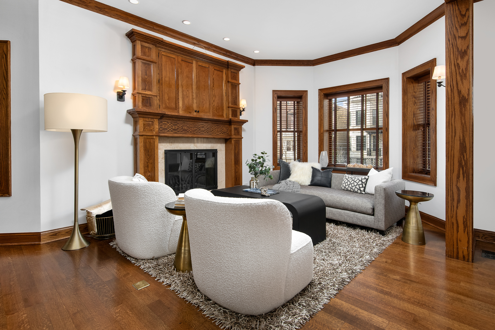 3733 North Wayne Avenue Chicago, IL 60613 - Photo 3 of 40 a living room with furniture and a fireplace