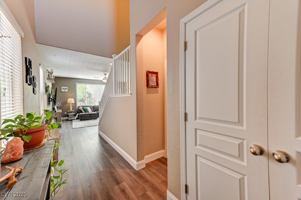 10281 Numaga Road Las Vegas, NV 89178 - Photo 12 of 41 Corridor featuring baseboards and wood finished floors