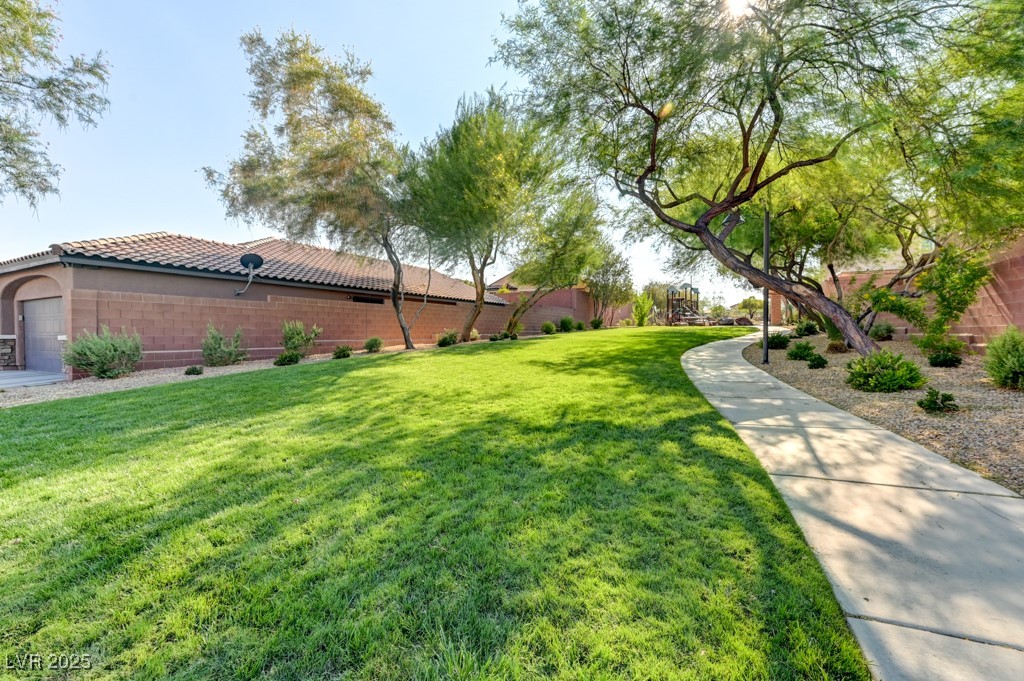 10281 Numaga Road Las Vegas, NV 89178 - Photo 38 of 41 View of green lawn