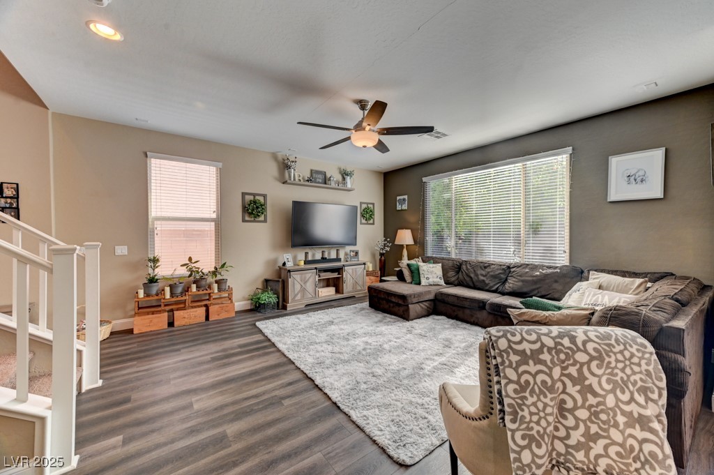 10281 Numaga Road Las Vegas, NV 89178 - Photo 7 of 41 Living room featuring stairway, dark wood-type flooring, ceiling fan, and recessed lighting