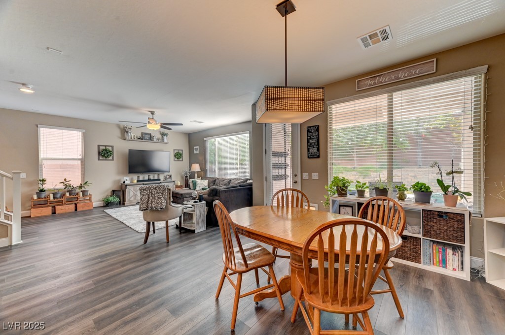 10281 Numaga Road Las Vegas, NV 89178 - Photo 10 of 41 Dining room featuring dark wood-type flooring and a ceiling fan
