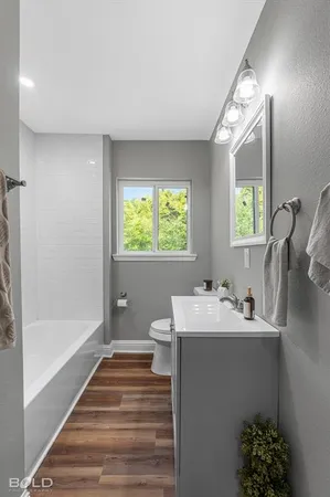a bathroom with a sink and a bathtub