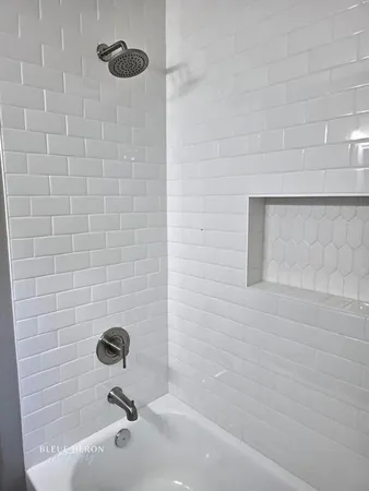 a bathroom with a bathtub