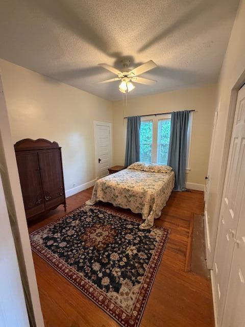 82 Nightingale Street Barnwell, SC 29812 - Photo 8 of 13 a bedroom with wooden floor and window