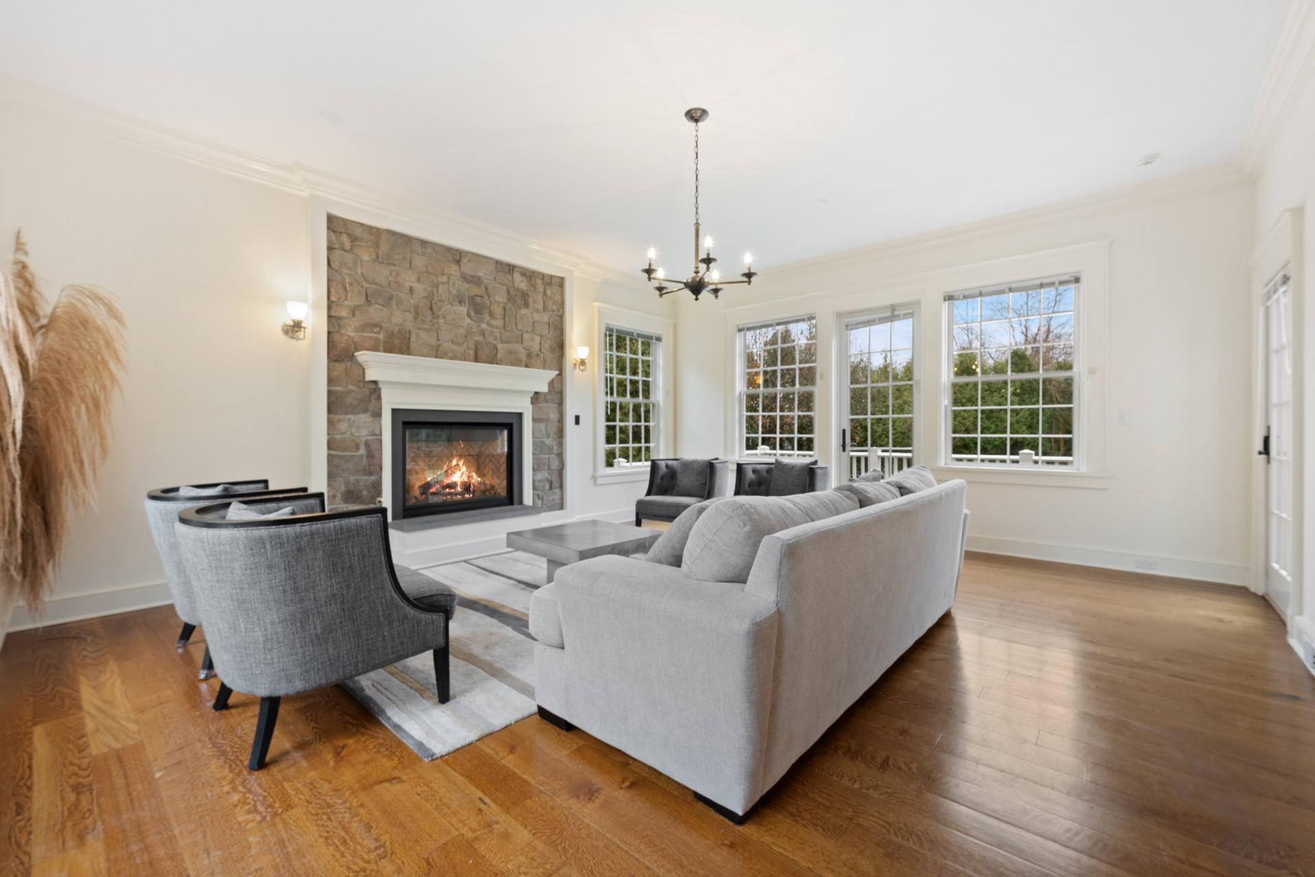 5020 Grosvenor Avenue, Unit 1 Bronx, NY 10471 - Photo 12 of 32 a living room with furniture and a fireplace