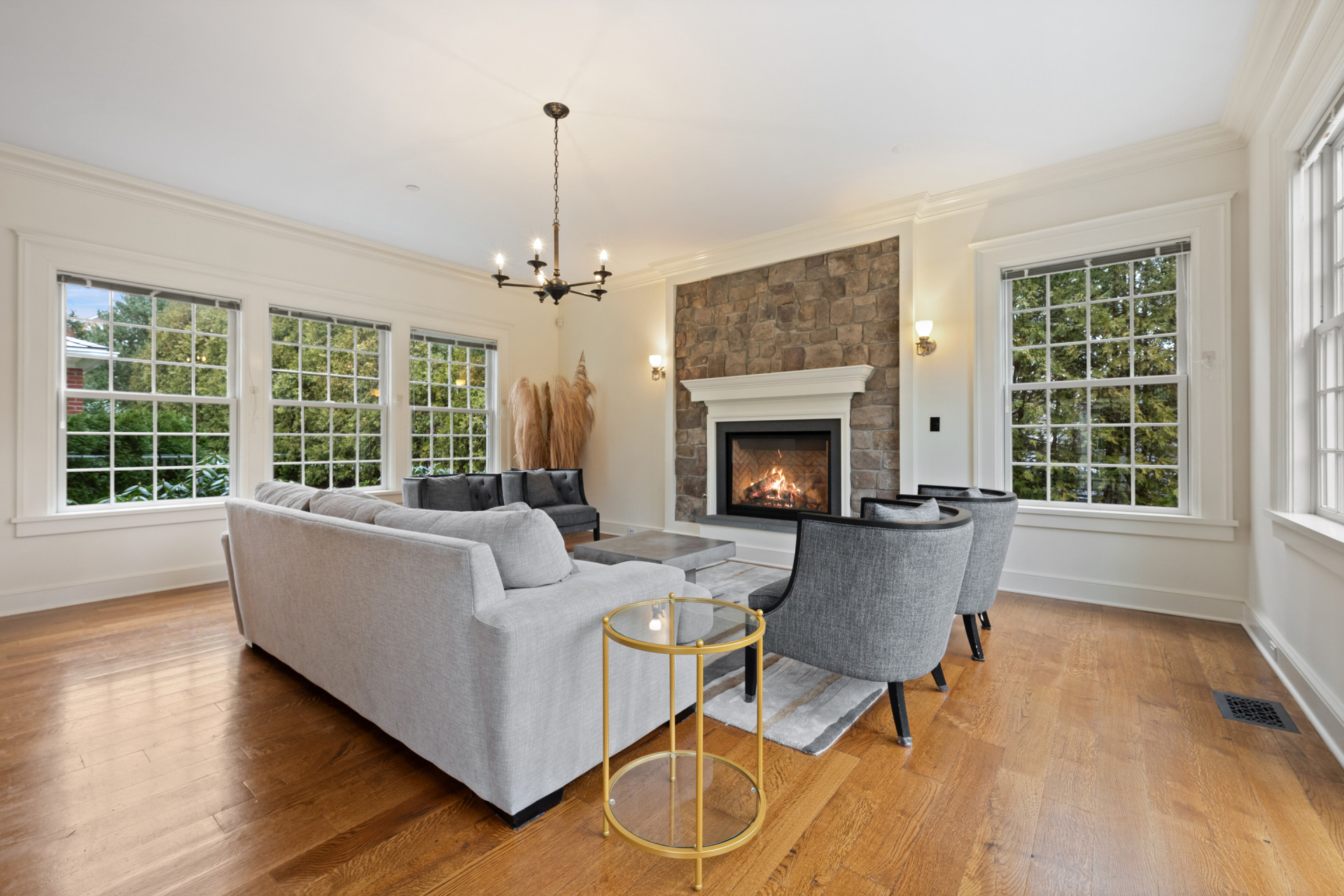 5020 Grosvenor Avenue, Unit 1 Bronx, NY 10471 - Photo 13 of 32 a living room with furniture and a fireplace