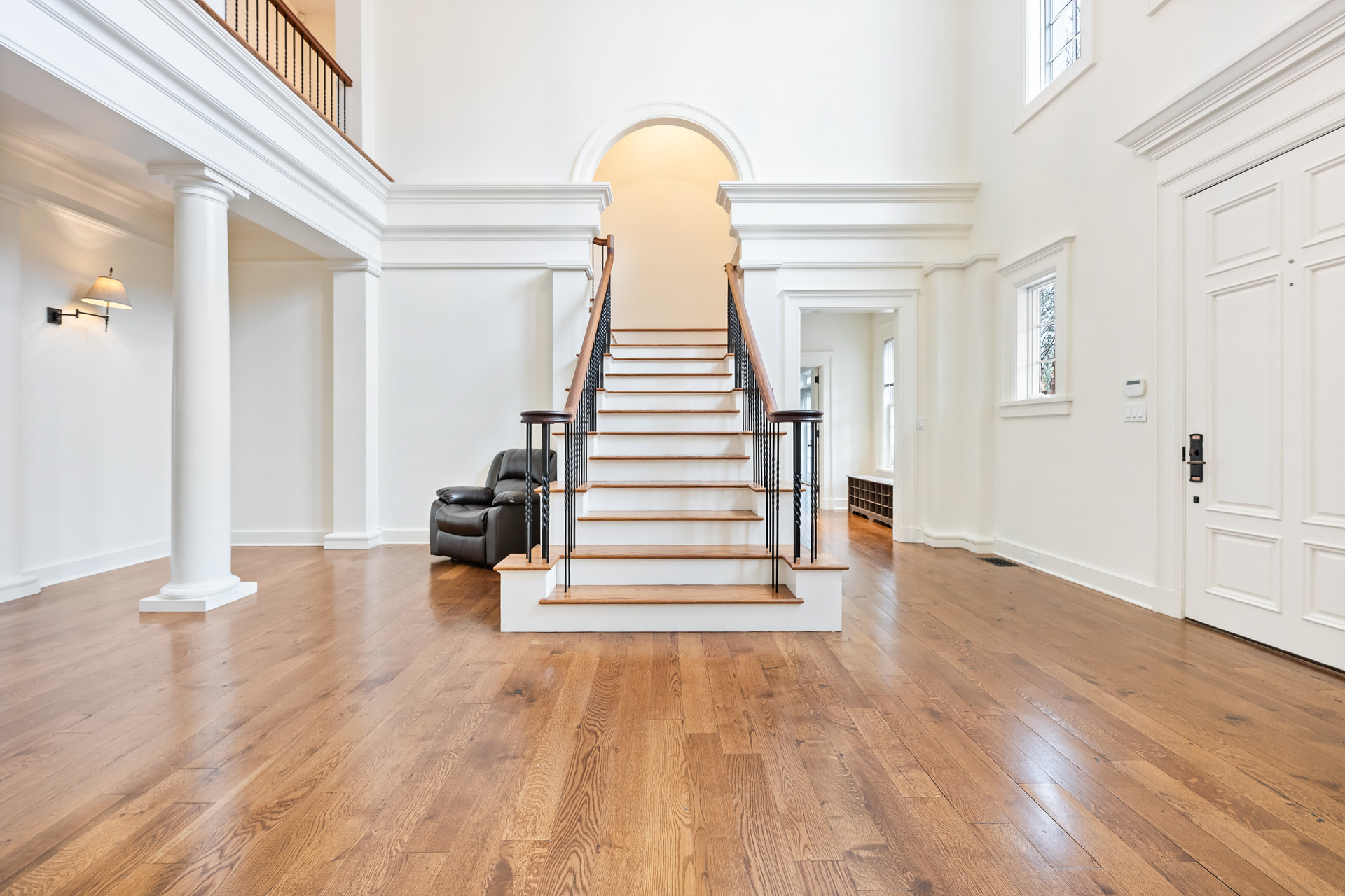 5020 Grosvenor Avenue, Unit 1 Bronx, NY 10471 - Photo 21 of 32 a view of a room with wooden floor and stairs