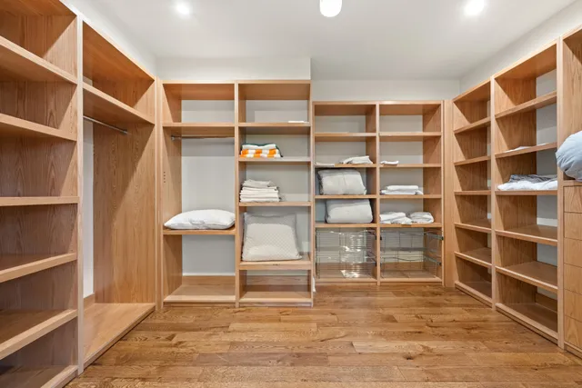 a view of a livingroom with furniture and closet