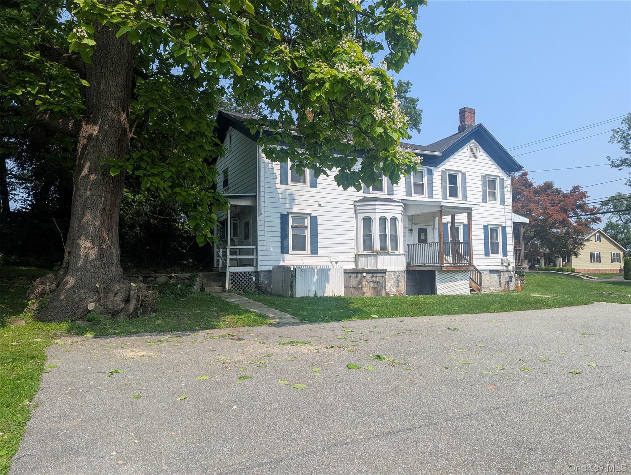 265 Goodwill Road Montgomery, NY 12549 - Photo 3 of 41 View of front of house featuring a chimney and a front lawn