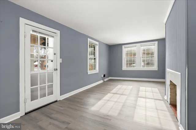 an empty room with windows