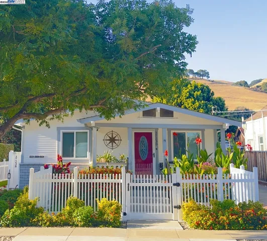 a front view of a house having patio