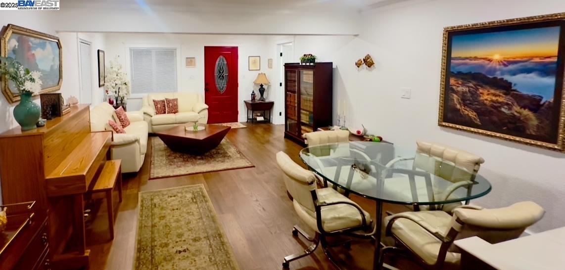 37230 2nd Street Fremont, CA 94536 - Photo 11 of 49 a living room with furniture and a flat screen tv