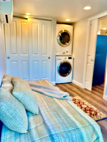 a large kitchen with kitchen island a sink stainless steel appliances and cabinets