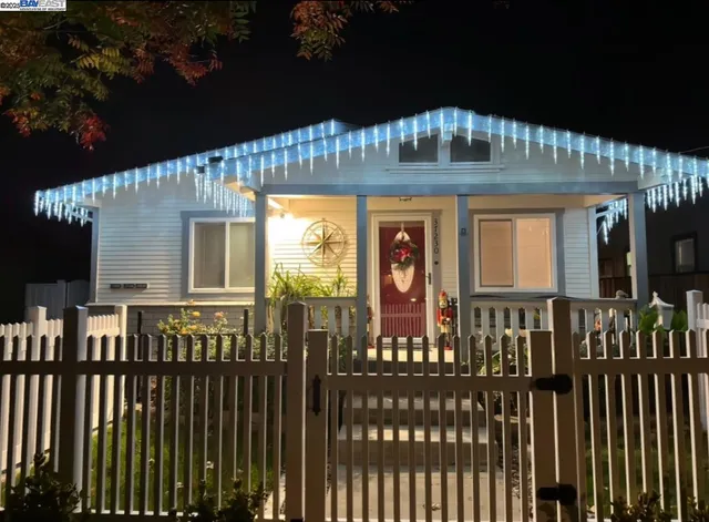 a view of house with outdoor space