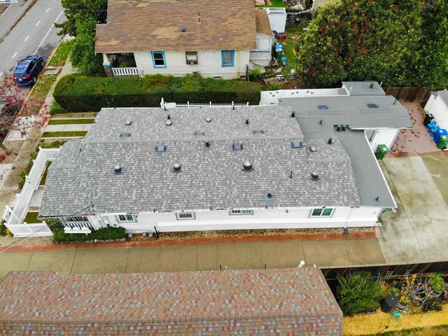 an aerial view of a house with swimming pool