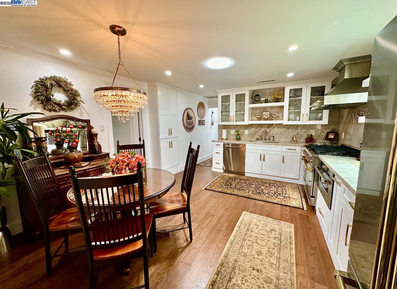 37230 2nd Street Fremont, CA 94536 - Photo 5 of 49 a view of a dining room with furniture wooden floor and chandelier