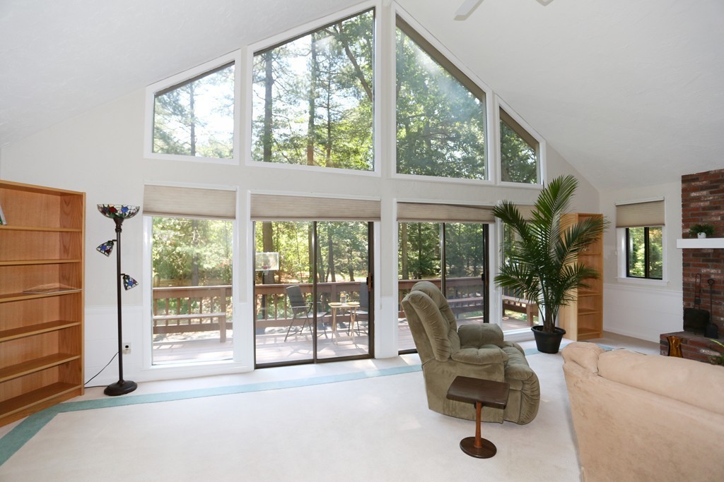 96 Stock Farm Road Sudbury, MA 01776 - Photo 12 of 30 a living room with furniture and a large window