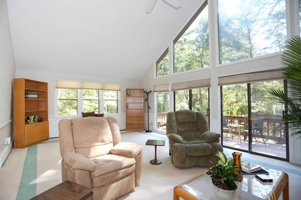 96 Stock Farm Road Sudbury, MA 01776 - Photo 14 of 30 a living room with furniture and large windows