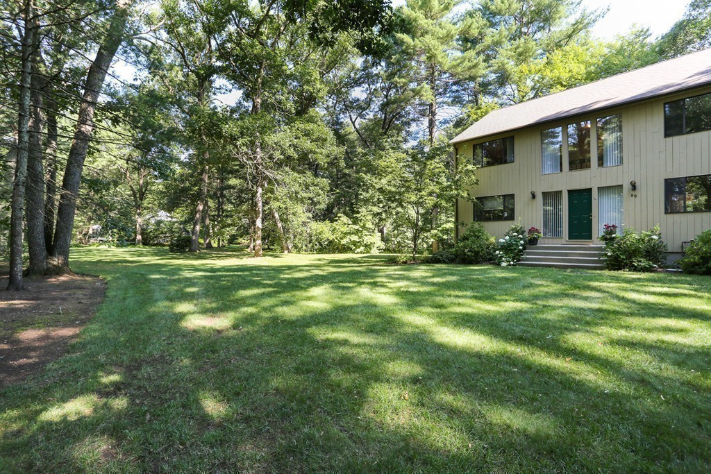96 Stock Farm Road Sudbury, MA 01776 - Photo 27 of 30 a front view of house with yard and green space