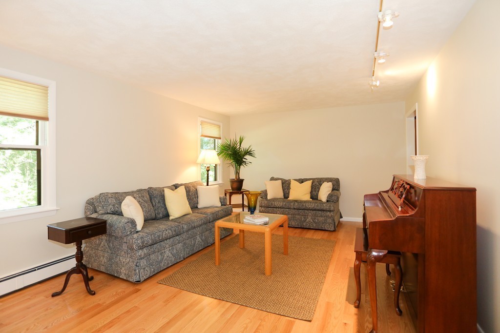96 Stock Farm Road Sudbury, MA 01776 - Photo 5 of 30 a living room with furniture and a window