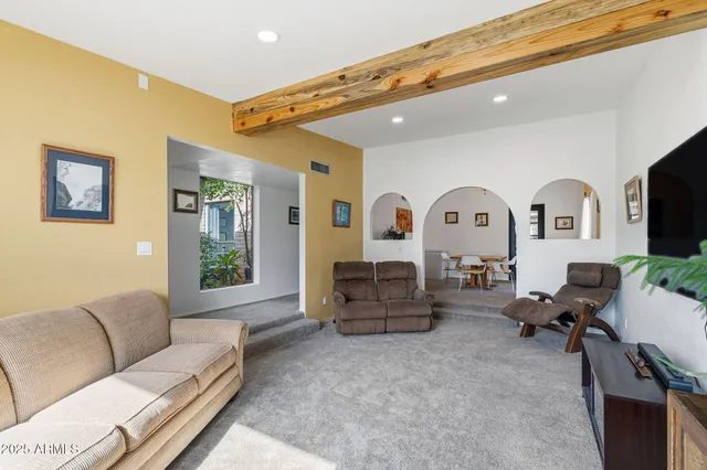 a bathroom with a double vanity sink and mirror