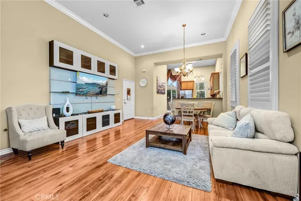 a living room with furniture fireplace and flat screen tv