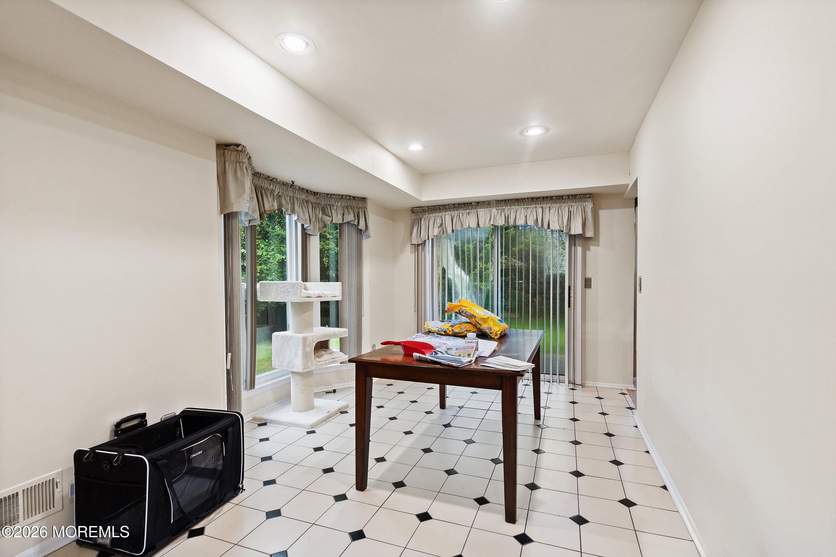 47 Sweet Gum Road Howell, NJ 07731 - Photo 14 of 27 a room with furniture a rug and a window