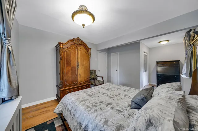 a view of room with wooden floor and window