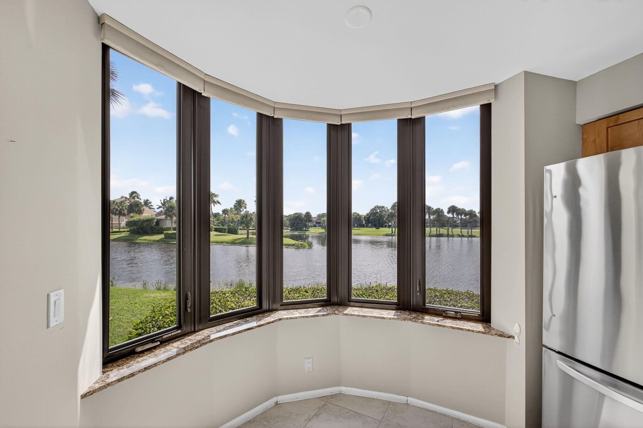 16885 Waterbend Drive, Unit 175 Jupiter, FL 33477 - Photo 15 of 43 a view of an empty room and window