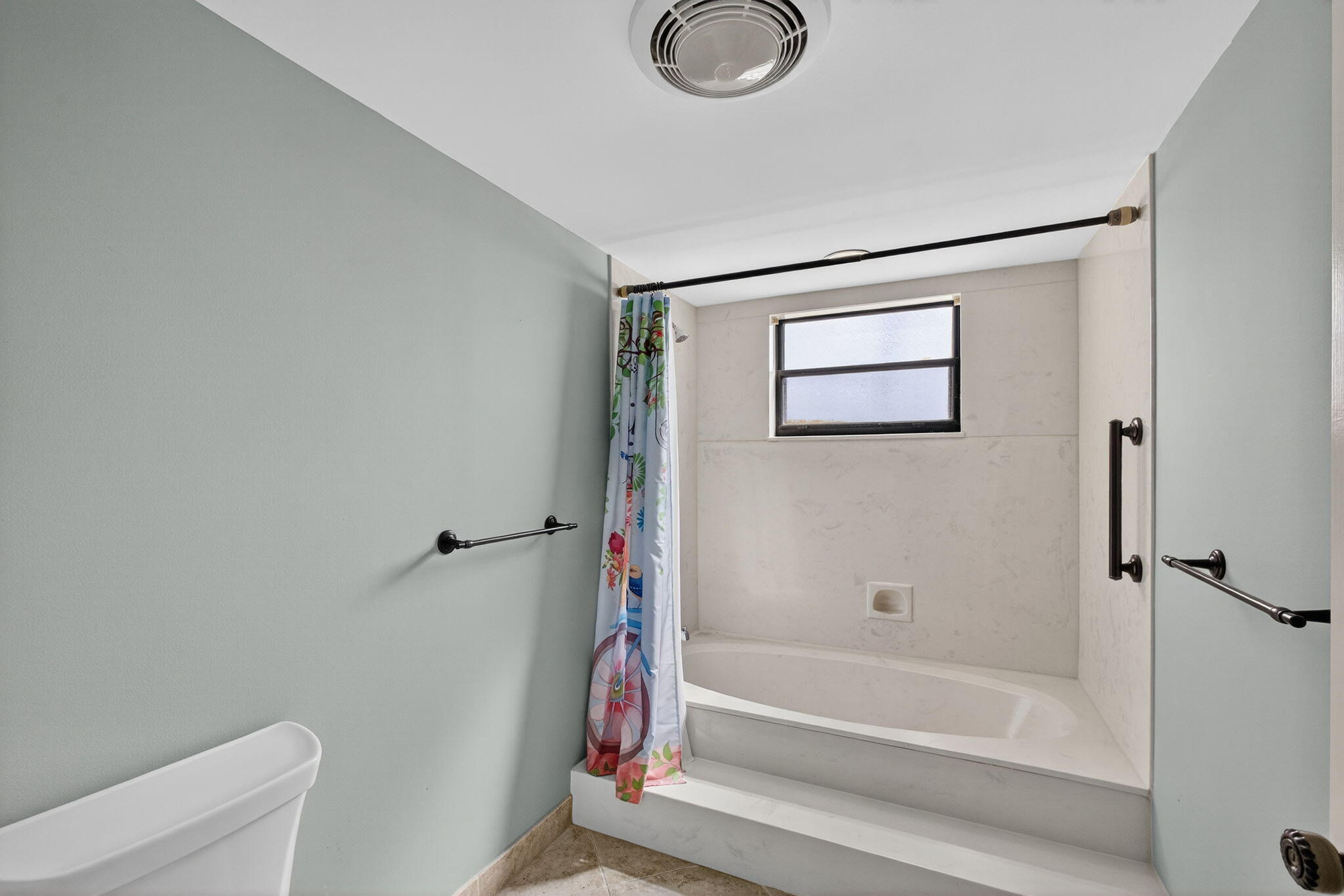 16885 Waterbend Drive, Unit 175 Jupiter, FL 33477 - Photo 27 of 43 a bathroom with a shower and a bath tub