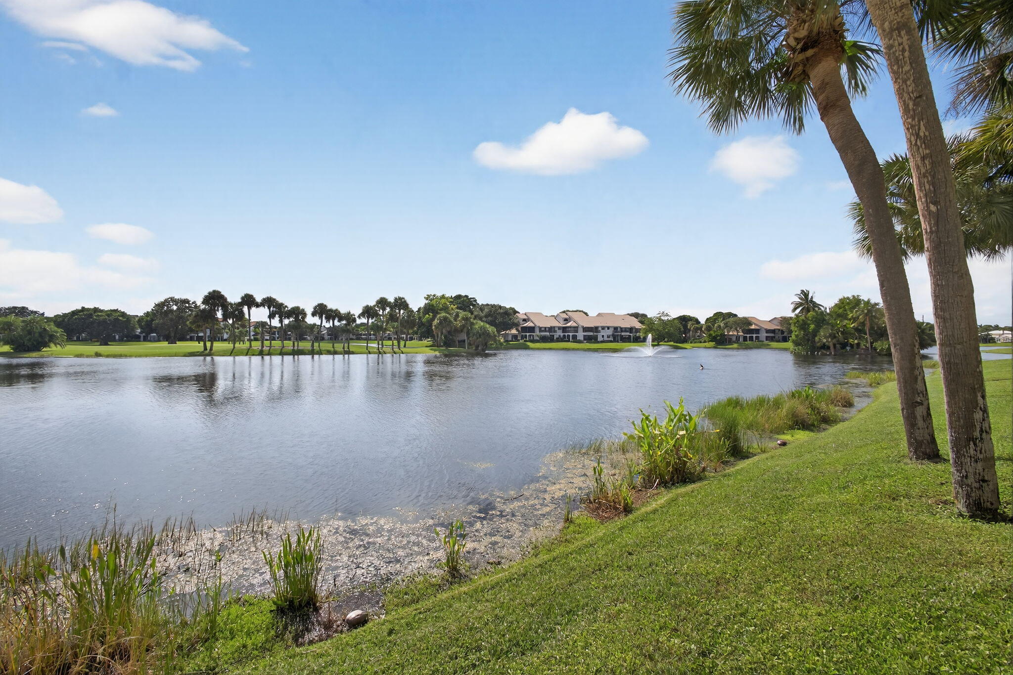 16885 Waterbend Drive, Unit 175 Jupiter, FL 33477 - Photo 32 of 43 a view of a lake