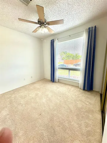 a view of a room with a large window