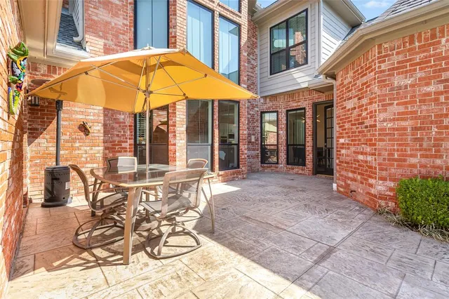 a view of a house with a patio