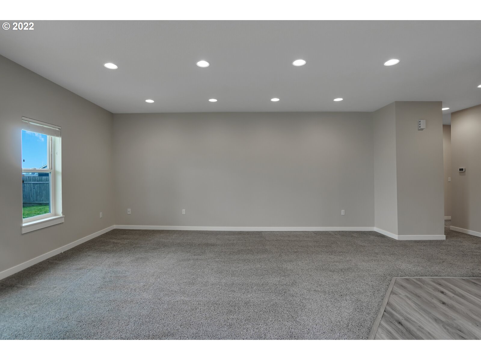 542 East Elm Loop Gervais, OR 97026 - Photo 11 of 32 a view of an empty room with a window