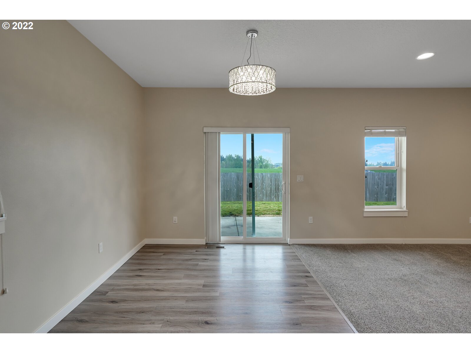 542 East Elm Loop Gervais, OR 97026 - Photo 14 of 32 a view of an empty room with a window