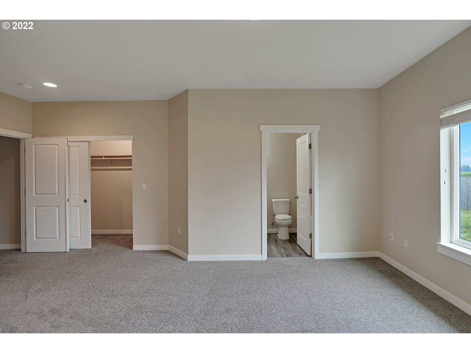 542 East Elm Loop Gervais, OR 97026 - Photo 27 of 32 a view of an empty room with a window