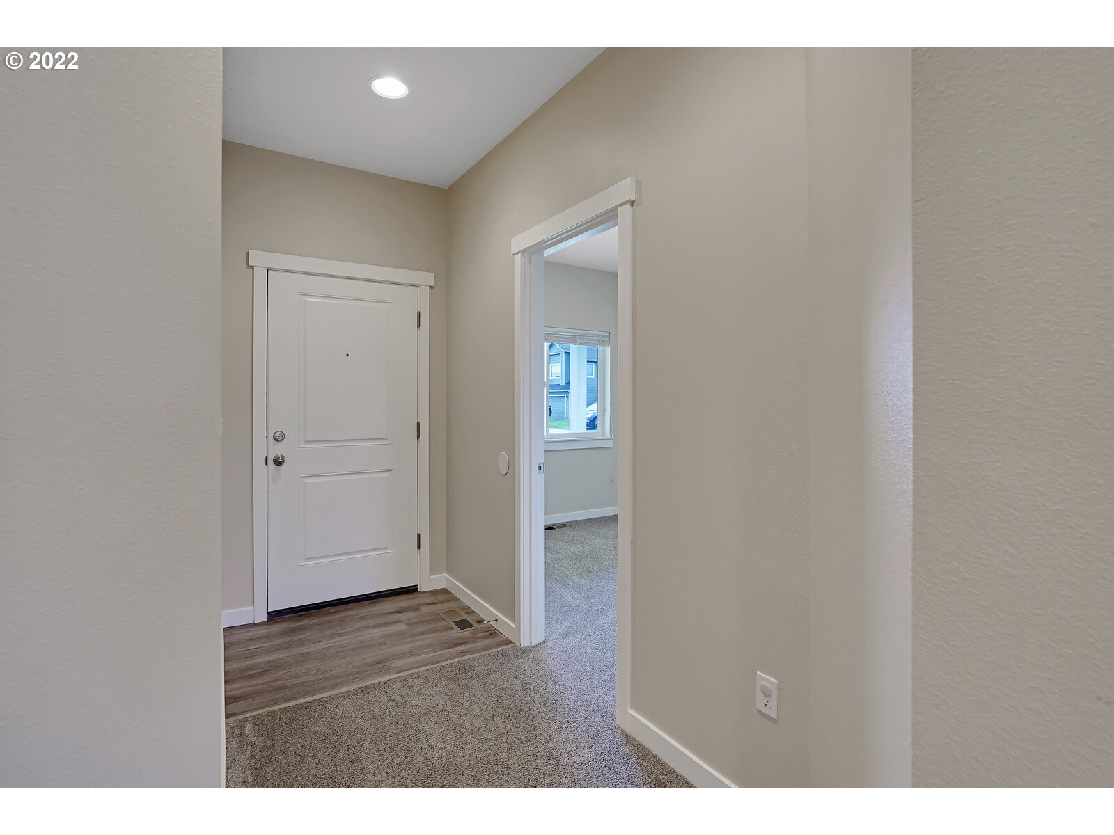 542 East Elm Loop Gervais, OR 97026 - Photo 6 of 32 a view of hallway with wooden floor