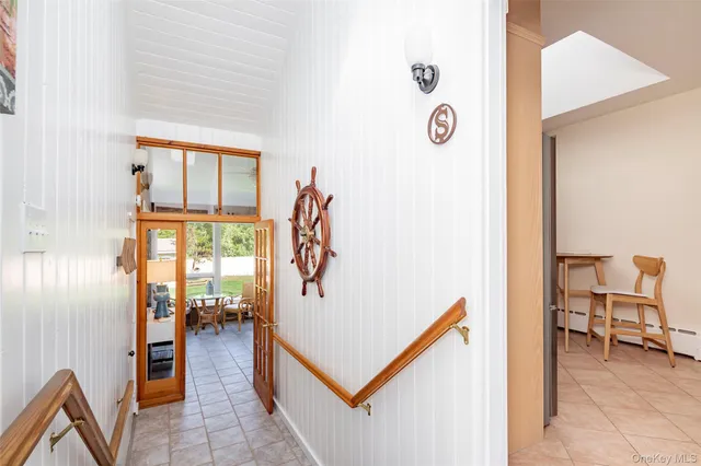 a view of living room with furniture and front door