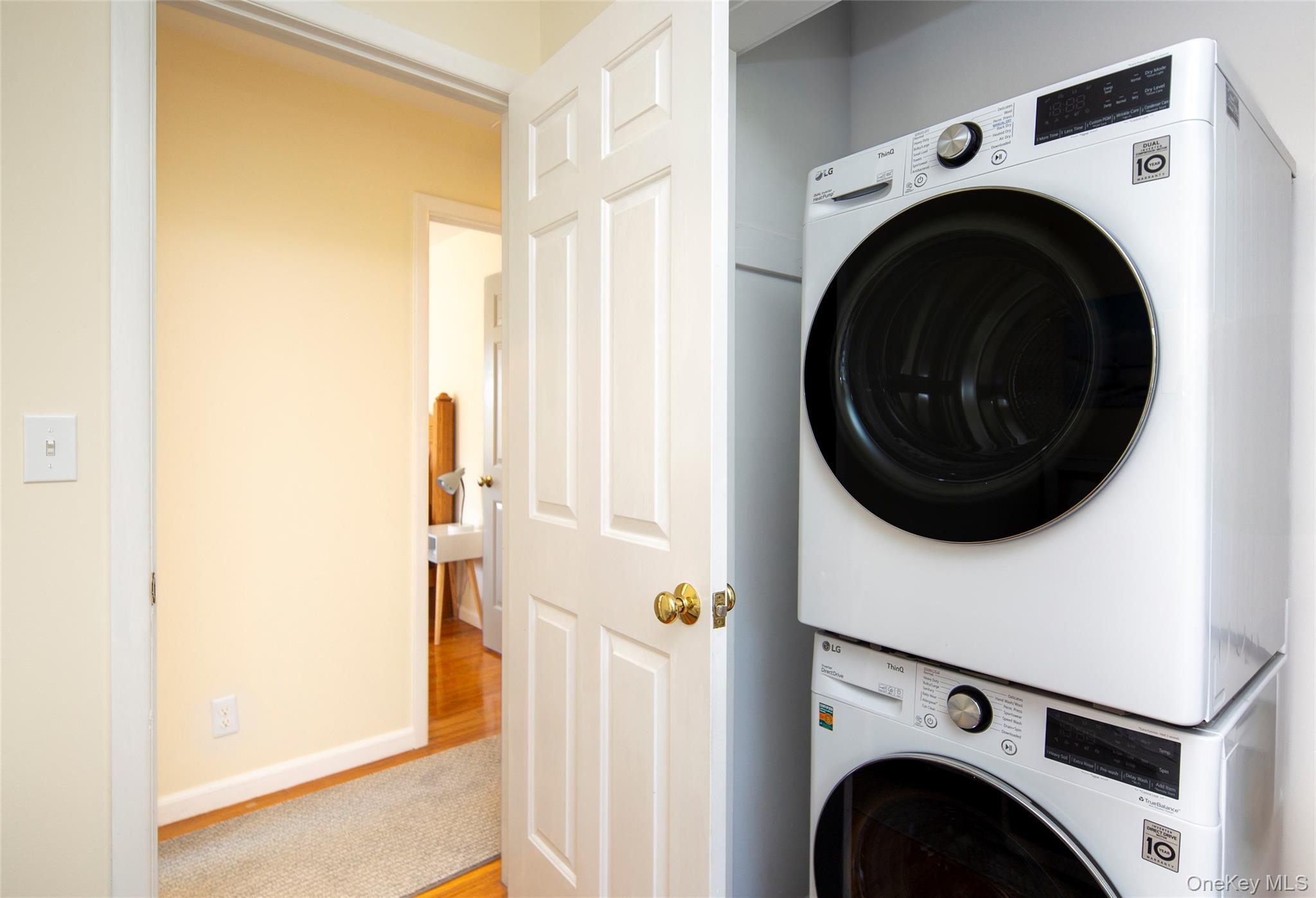 275 Maier Place Southold, NY 11971 - Photo 21 of 27 a view of entryway with washer and dryer
