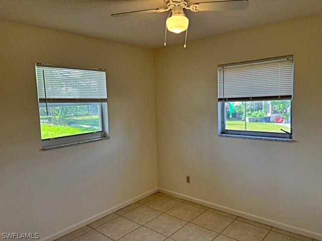 1420 Homestead Road North Lehigh Acres, FL 33936 - Photo 6 of 13 a view of an empty room with a window