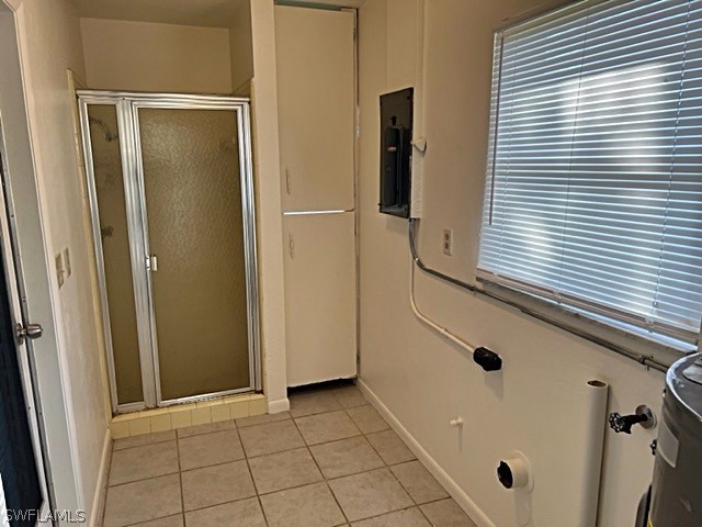 1420 Homestead Road North Lehigh Acres, FL 33936 - Photo 8 of 13 a bathroom with a sink a mirror and shower
