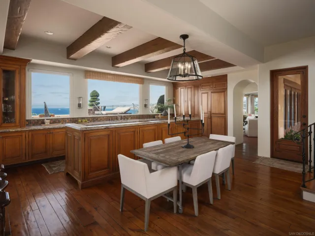 a large bedroom with a large bed and a large window