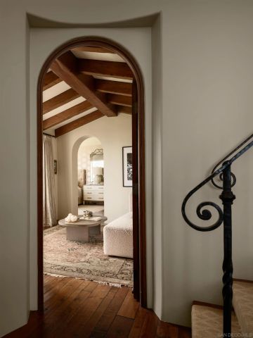 a living room with fireplace furniture and a flat screen tv