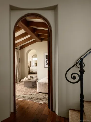 a living room with fireplace furniture and a flat screen tv