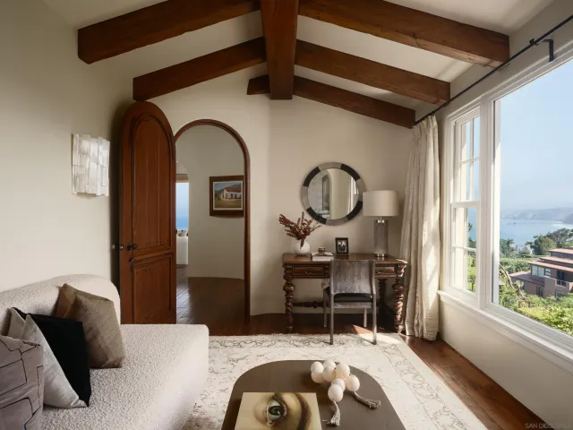 a large living room with a large window