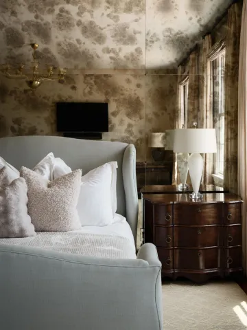 a front view of a house with swing plants