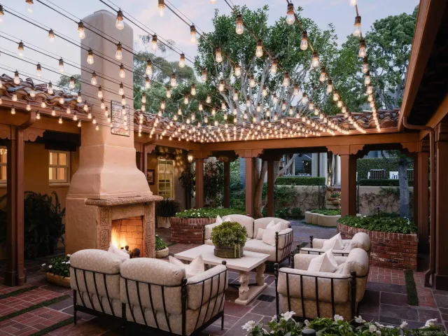 a view of swimming pool with outdoor seating and city view