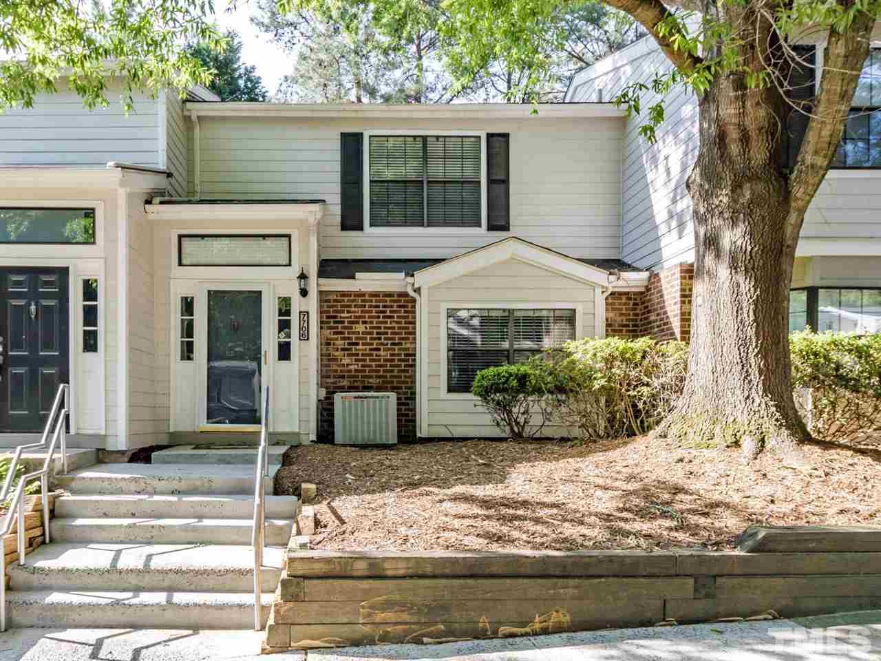 7706 Falcon Rest Circle, Unit N/A Raleigh, NC 27615 - Photo 1 of 19 front view of a house