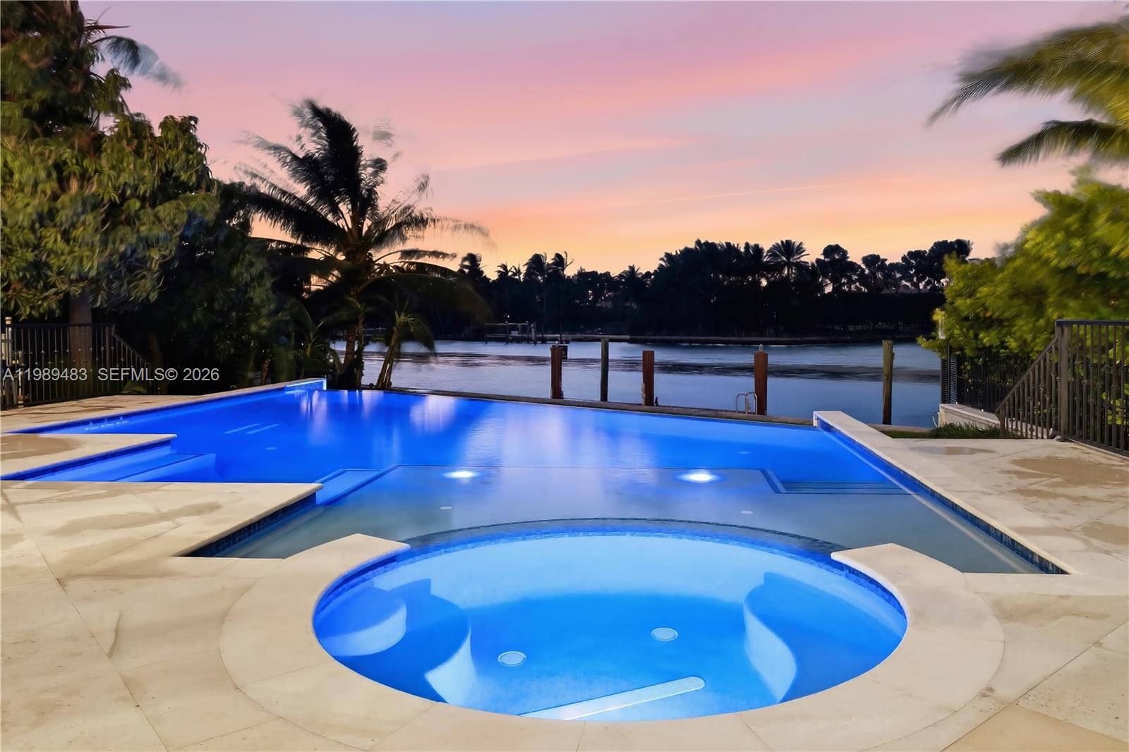 919 92nd Street Surfside, FL 33154 - Photo 11 of 74 a view of swimming pool with seating space